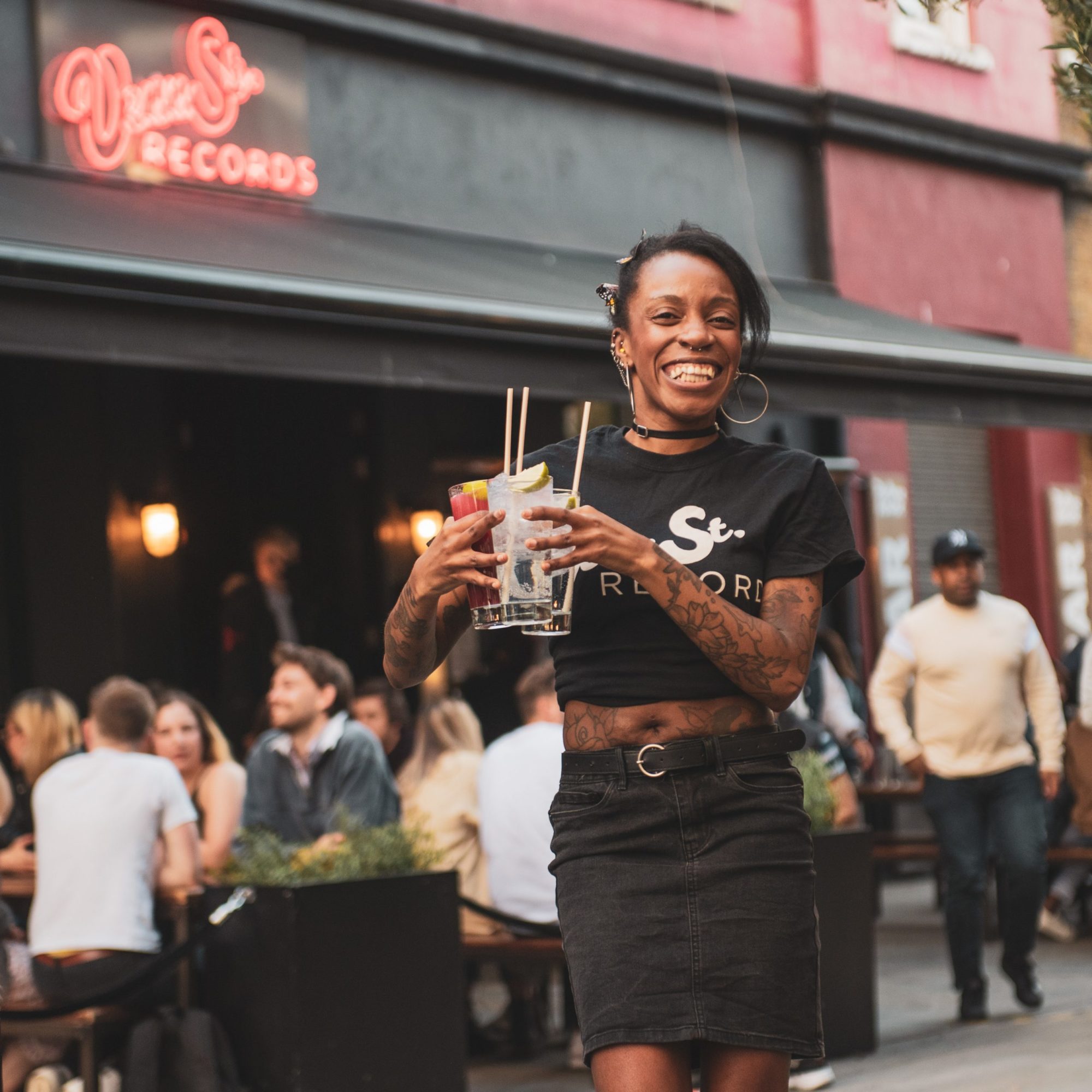 Cocktails in Venn Street Records beer garden, Clapham.