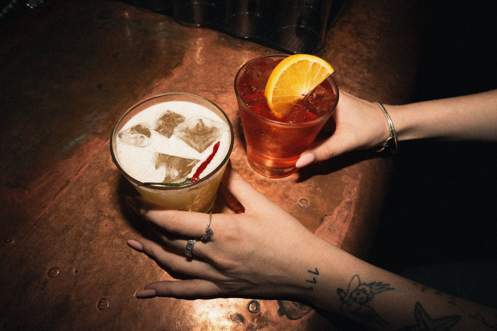 One margarita and one negroni cocktails.